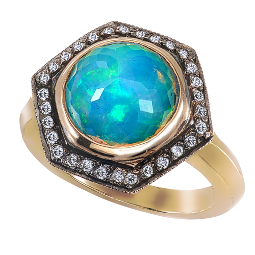 blue ring with diamonds and a gold band
