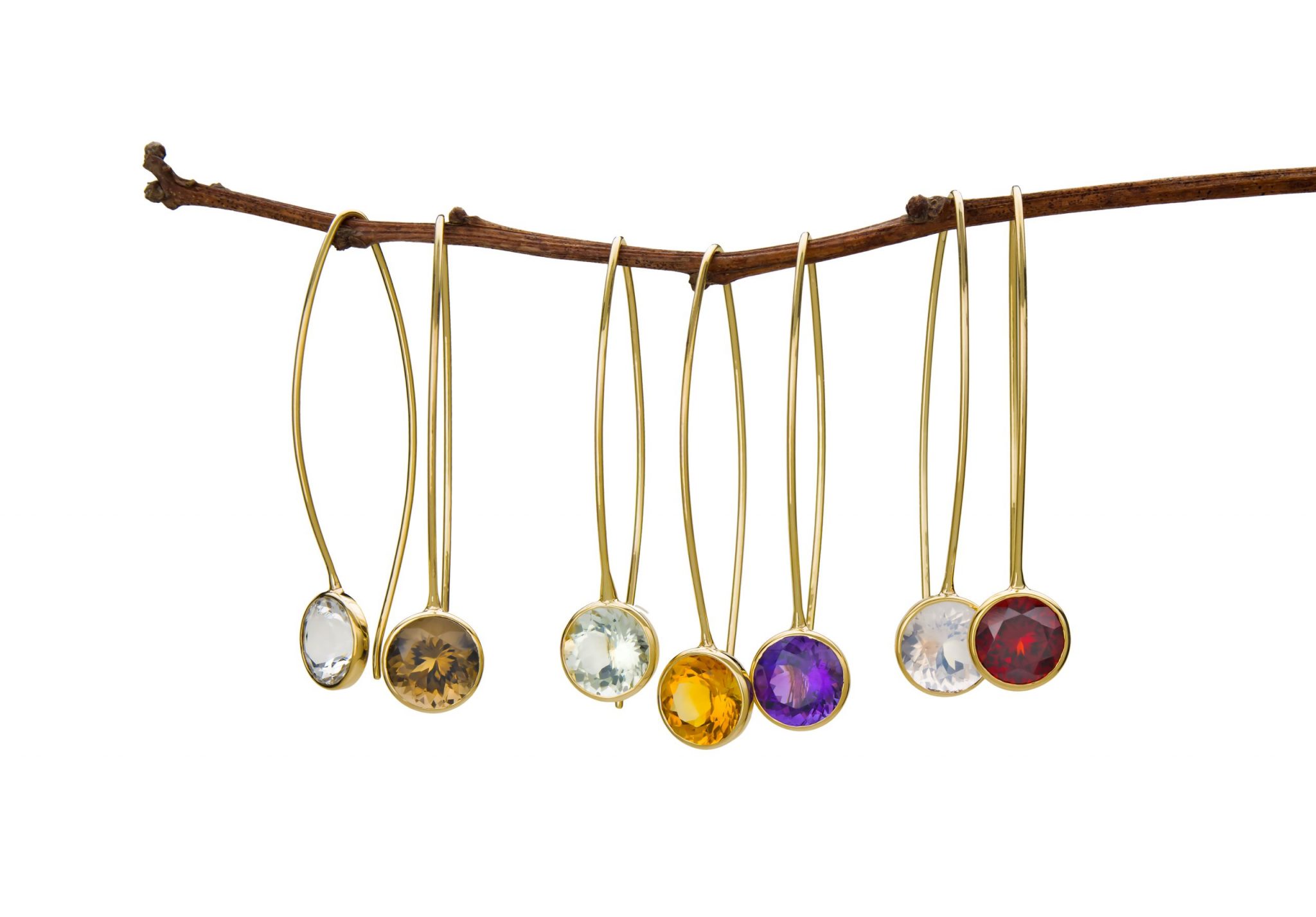 Toby Pomeroy necklaces with white, gold, purple, and red stones