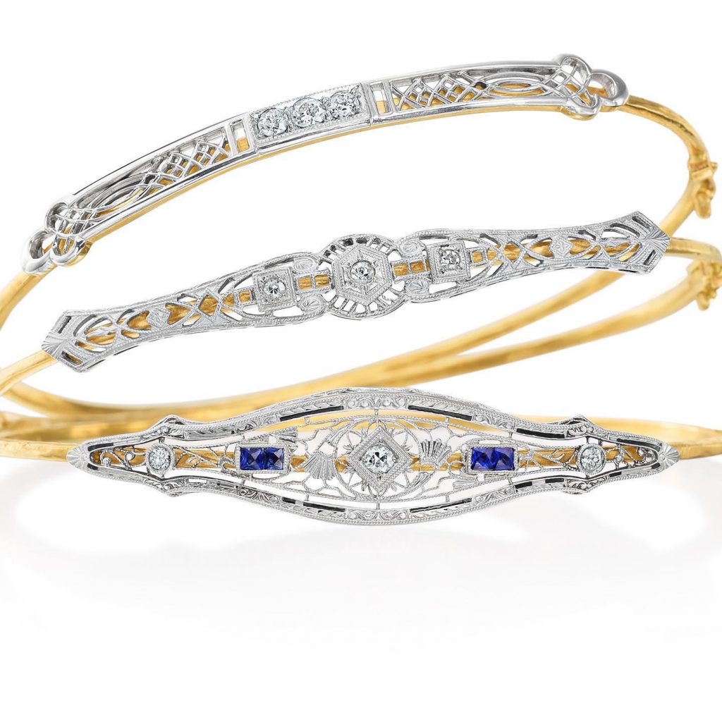 gold, silver, and blue bracelets