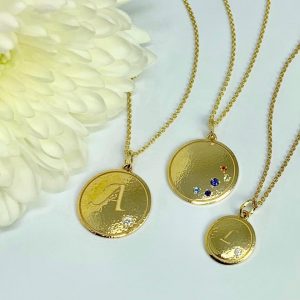Gold monogrammed pendants