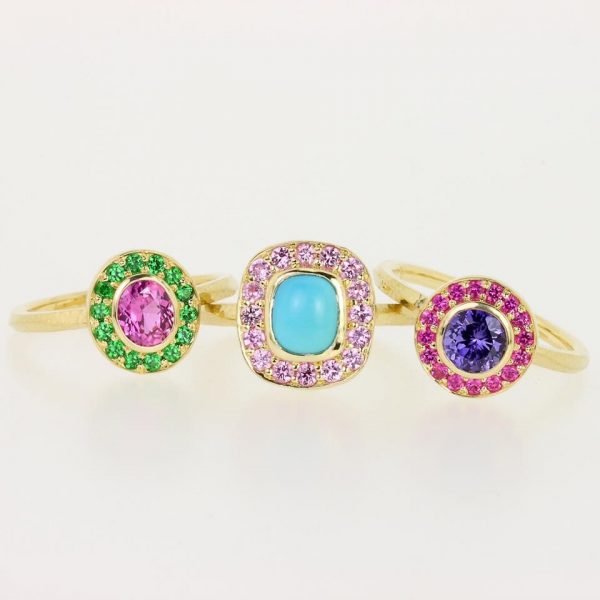 gold, green, blue, and purple rings