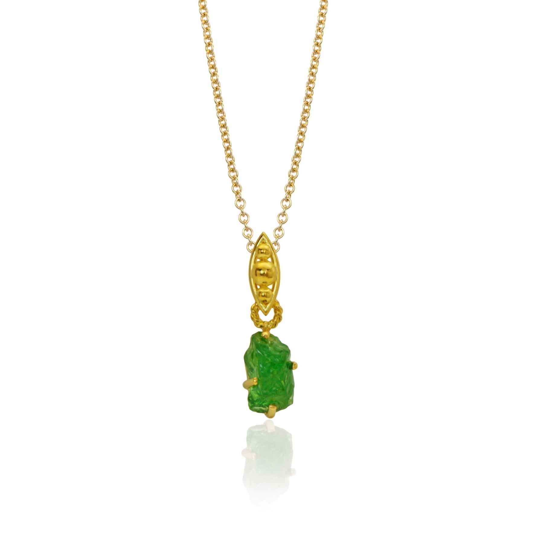 gold and green pendant